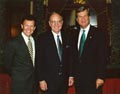 Image: Senators Tom Daschle and Trent Lott welcome George Mitchell.