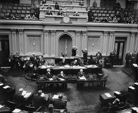 On January 4, 1939, in the U.S. Senate Chamber, Vice President John Nance Garner issues the oath of office to Senator Elmer Thomas of Oklahoma.