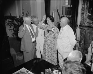 Vice President John Nance Garner and Dixie Bibb Graves of Alabama reenact her swearing-in in his Capitol office.