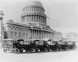 Government Printing Office trucks in front of the Capitol