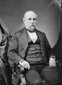 Black and white photograph of James Alcorn seated.
