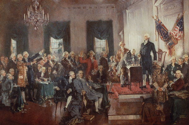 Painting of the signing of the Constitution at the Constitutional Convention, with known figures such as George Washington and Benjamin Franklin.