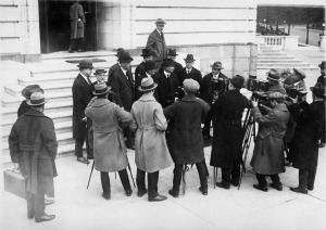 Senate Teapot Dome Investigating Committee poses for group of movie cameramen.