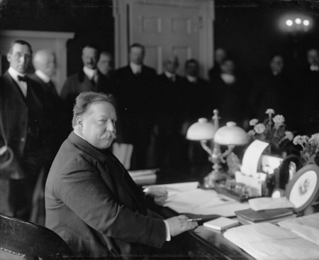 President William Howard Taft signing New Mexico's statehood bill.