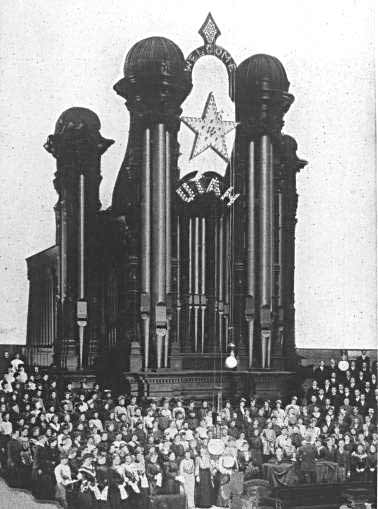 The Salt Lake Tabernacle decorated with a star and "Utah" to celebrate statehood in 1896.